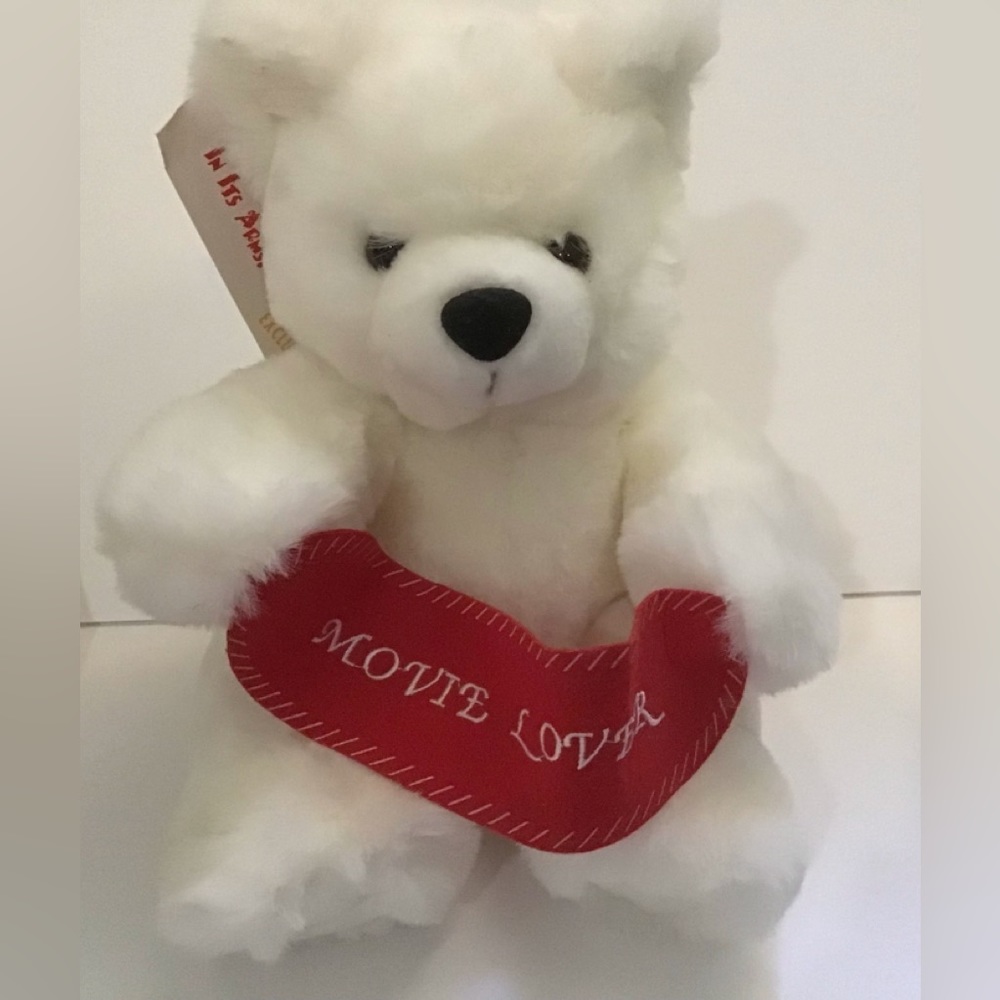NWT Blockbuster video rare clean plush white stuffed teddy bear. Very cuddly